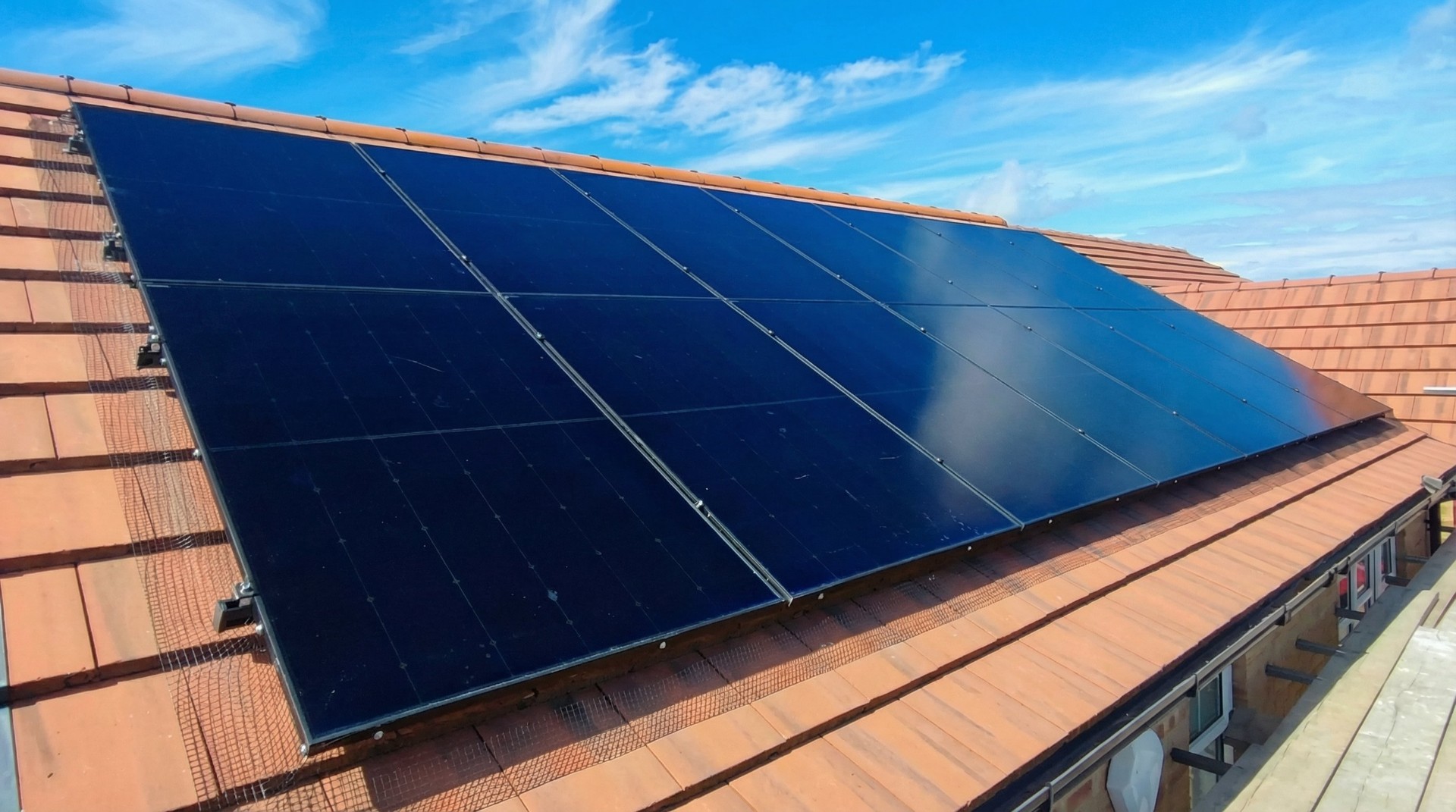 Modern home with solar panels on roof
